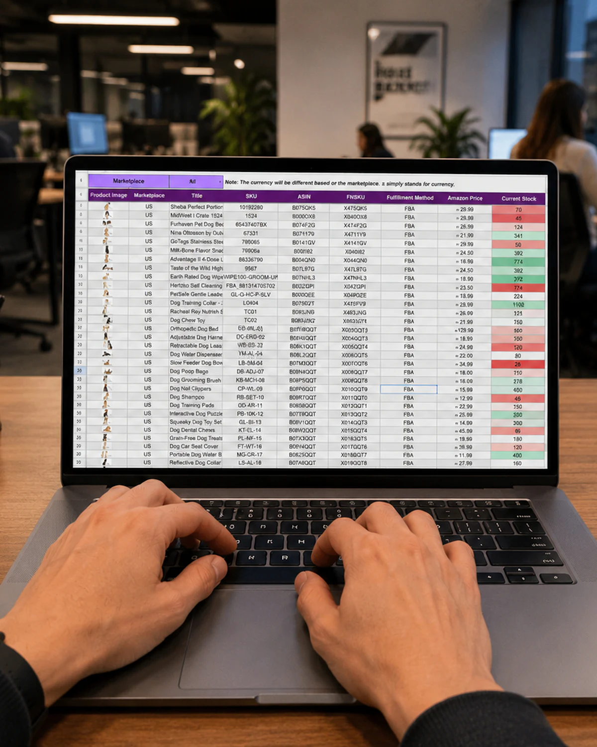Hands working on a fee spreadsheet on a laptop